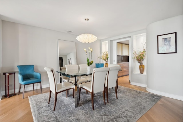 2314 N Lincoln Park W Unit 11S, Chicago, IL 60614 - dining area with light wood-style floors and baseboards