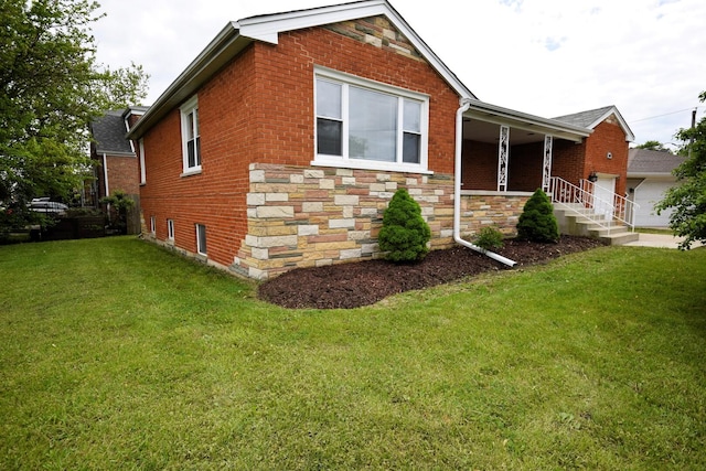 5009 W 79th Pl, Burbank, IL 60459 - view of home's exterior with a yard, brick siding, covered porch, and a garage