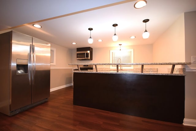 5009 W 79th Pl, Burbank, IL 60459 - kitchen with stainless steel appliances, dark wood finished floors, decorative light fixtures, recessed lighting, and baseboards