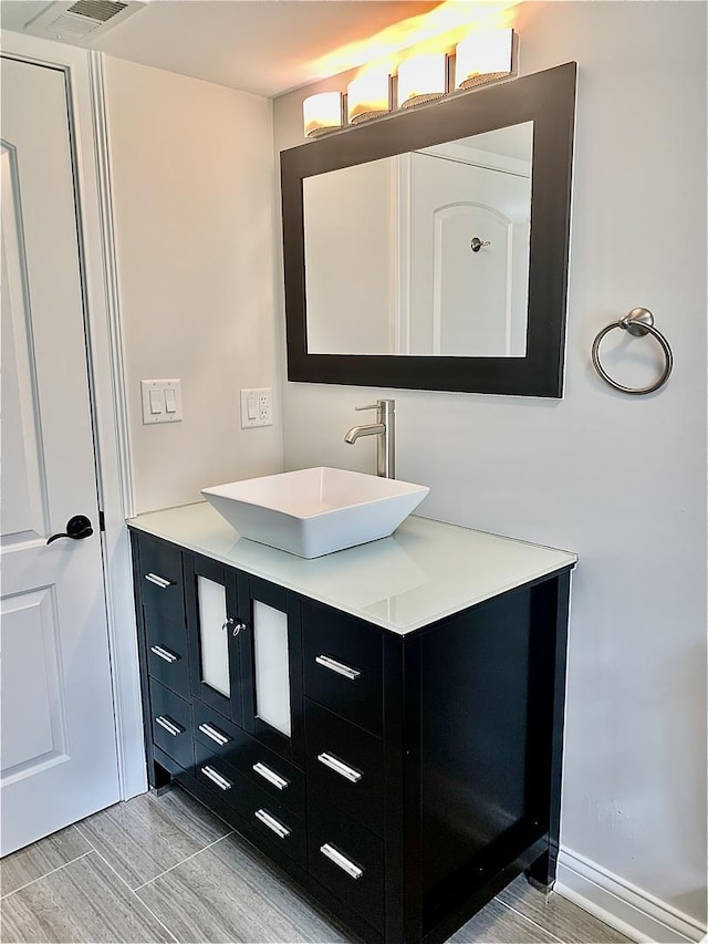 5009 W 79th Pl, Burbank, IL 60459 - bathroom with vanity and wood finished floors
