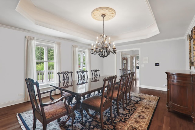 6537 Stockbridge Ln, Long Grove, IL 60047 - dining space featuring a raised ceiling, a chandelier, dark wood finished floors, baseboards, and ornamental molding