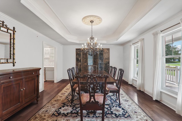 6537 Stockbridge Ln, Long Grove, IL 60047 - dining space with a chandelier, a raised ceiling, dark wood-type flooring, baseboards, and crown molding