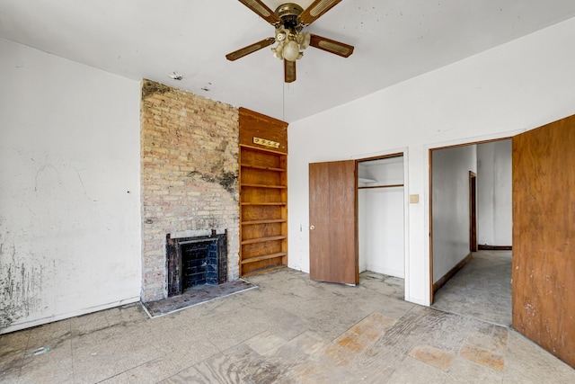 4728 S Evans Ave, Chicago, IL 60615 - unfurnished living room with a ceiling fan, a fireplace, and built in features