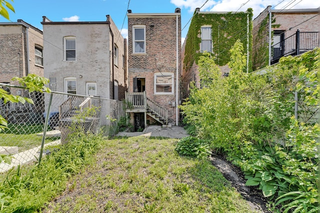 4728 S Evans Ave, Chicago, IL 60615 - rear view of house featuring brick siding