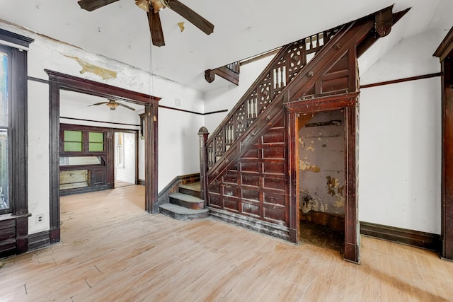 4728 S Evans Ave, Chicago, IL 60615 - staircase featuring ceiling fan, wood finished floors, and plenty of natural light