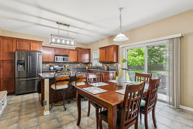 1885 W Greenleaf Ct, Round Lake, IL 60073 - dining room featuring baseboards