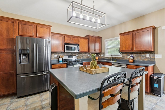 1885 W Greenleaf Ct, Round Lake, IL 60073 - kitchen with appliances with stainless steel finishes, dark countertops, and tasteful backsplash