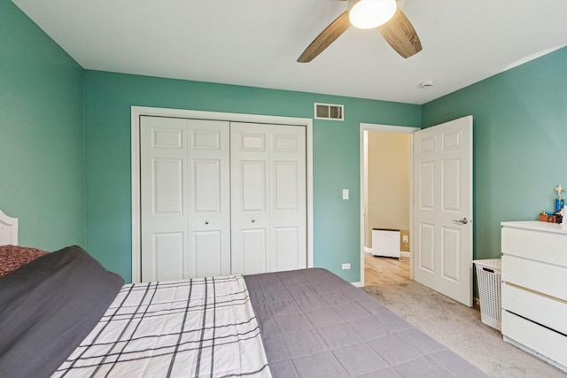 1885 W Greenleaf Ct, Round Lake, IL 60073 - bedroom featuring a closet, a ceiling fan, and carpet