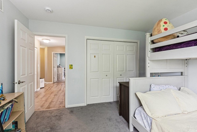 1885 W Greenleaf Ct, Round Lake, IL 60073 - bedroom with carpet flooring, a closet, and baseboards