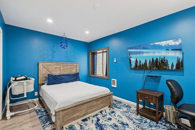1885 W Greenleaf Ct, Round Lake, IL 60073 - bedroom with baseboards, wood finished floors, and recessed lighting