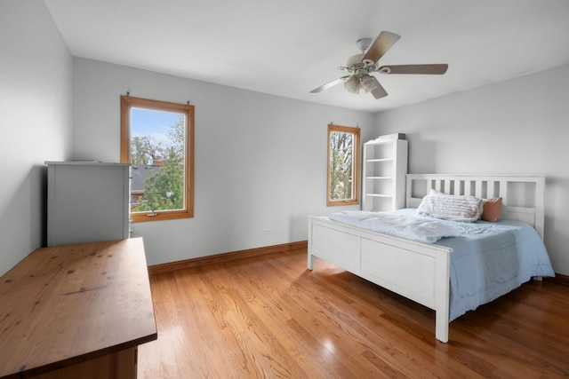 11725 Cooper Way, Orland Park, IL 60467 - bedroom featuring light wood finished floors, baseboards, and ceiling fan
