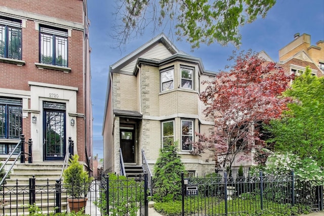 2722 N Bosworth Ave, Chicago, IL 60614 - view of front of house with brick siding and a fenced front yard