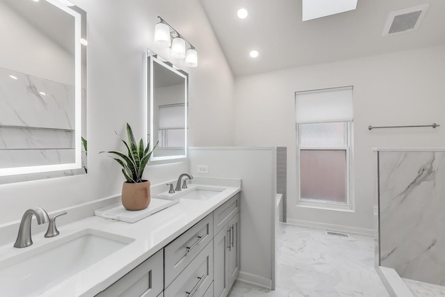2722 N Bosworth Ave, Chicago, IL 60614 - full bathroom featuring marble finish floors, double vanity, recessed lighting, a bathtub, and baseboards
