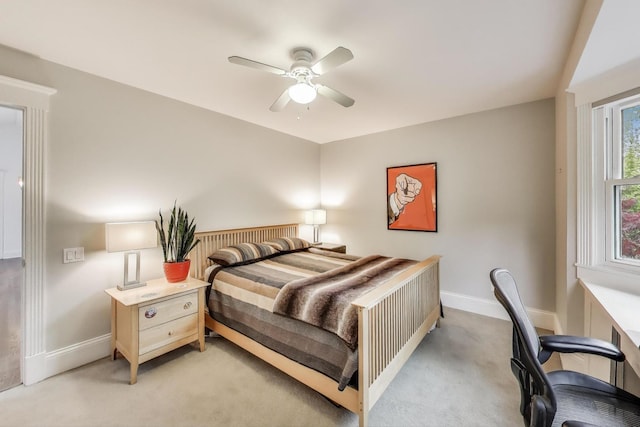 2722 N Bosworth Ave, Chicago, IL 60614 - bedroom featuring light carpet, baseboards, an office area, and a ceiling fan