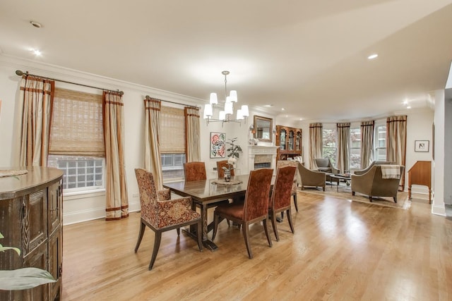 2722 N Bosworth Ave, Chicago, IL 60614 - dining area with a chandelier, crown molding, light wood-style flooring, baseboards, and recessed lighting