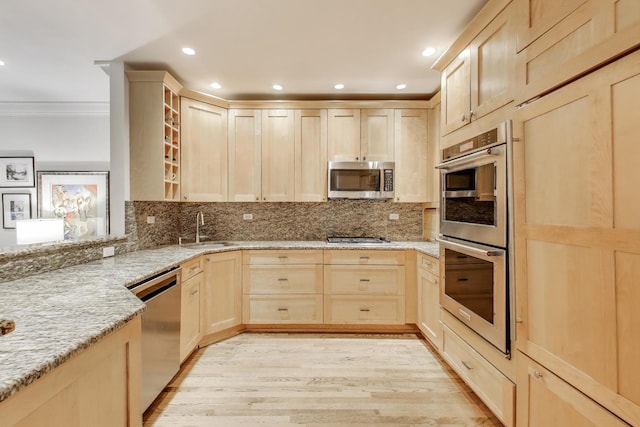 2722 N Bosworth Ave, Chicago, IL 60614 - kitchen featuring light brown cabinetry, stainless steel appliances, ornamental molding, a sink, and light stone countertops