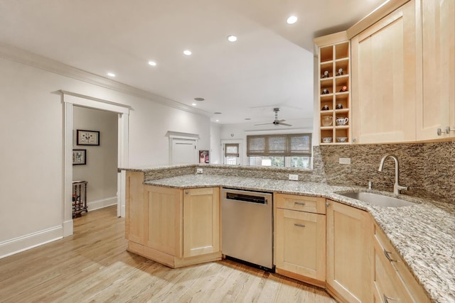 2722 N Bosworth Ave, Chicago, IL 60614 - kitchen featuring dishwasher, light brown cabinetry, a sink, a peninsula, and light stone counters