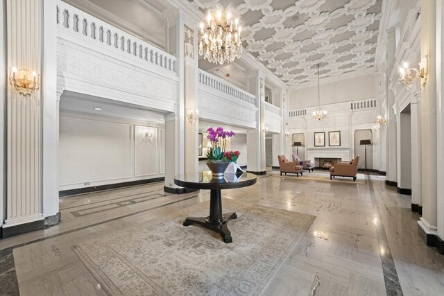 3530 N Lake Shore Dr Unit 12B, Chicago, IL 60657 - lobby with ornamental molding and a towering ceiling