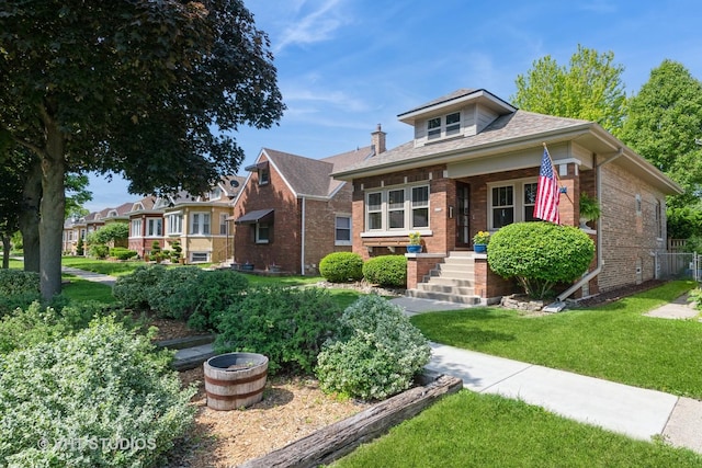 3726 Kenilworth Ave, Berwyn, IL 60402 - view of front of property with brick siding and a front yard