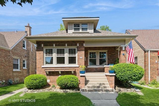 3726 Kenilworth Ave, Berwyn, IL 60402 - bungalow with a porch, brick siding, and a front lawn