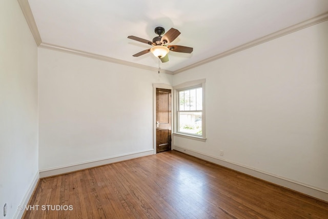 3726 Kenilworth Ave, Berwyn, IL 60402 - spare room with wood finished floors, a ceiling fan, crown molding, and baseboards