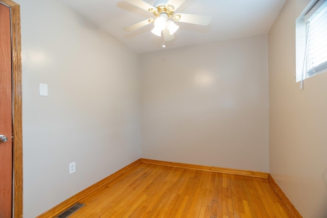 1326 N Harrison St, Algonquin, IL 60102 - unfurnished room with light wood finished floors, baseboards, and a ceiling fan
