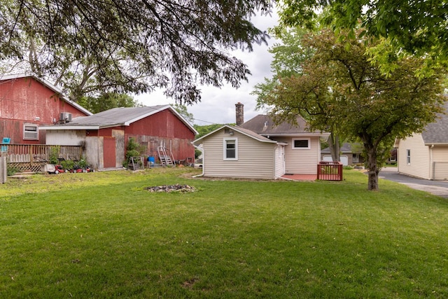 1326 N Harrison St, Algonquin, IL 60102 - view of green lawn featuring a wooden deck