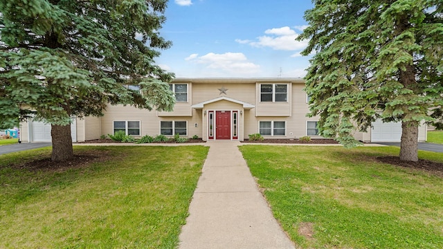 305 S Prairie Ave, Polo, IL 61064 - bi-level home with driveway and a front yard