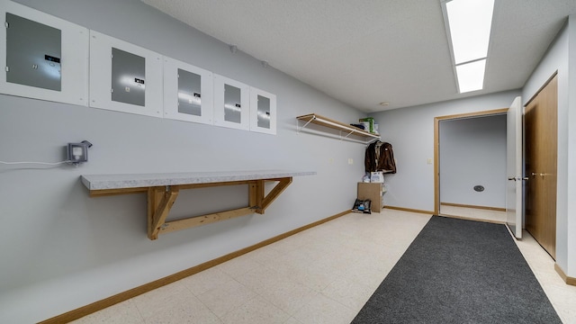 305 S Prairie Ave, Polo, IL 61064 - hallway featuring electric panel, tile patterned floors, and baseboards