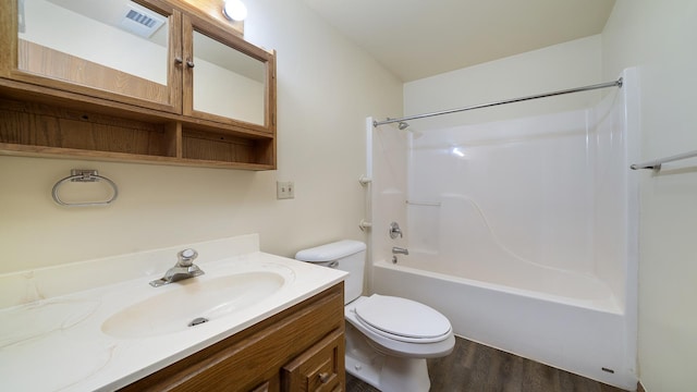 305 S Prairie Ave, Polo, IL 61064 - full bathroom with wood finished floors, toilet,  shower combination, and vanity