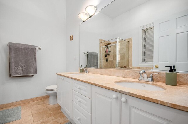 930 W Cuyler Ave Unit 3W, Chicago, IL 60613 - full bath with double vanity, a stall shower, and tile patterned flooring