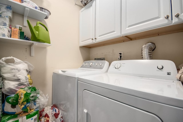 930 W Cuyler Ave Unit 3W, Chicago, IL 60613 - washroom featuring cabinet space and washer and clothes dryer