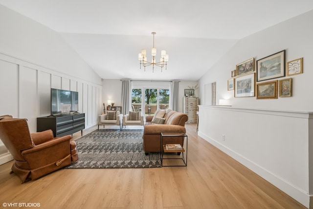 204 Barnwood Trl, Mchenry, IL 60050 - living area with light wood-style flooring, lofted ceiling, and a chandelier