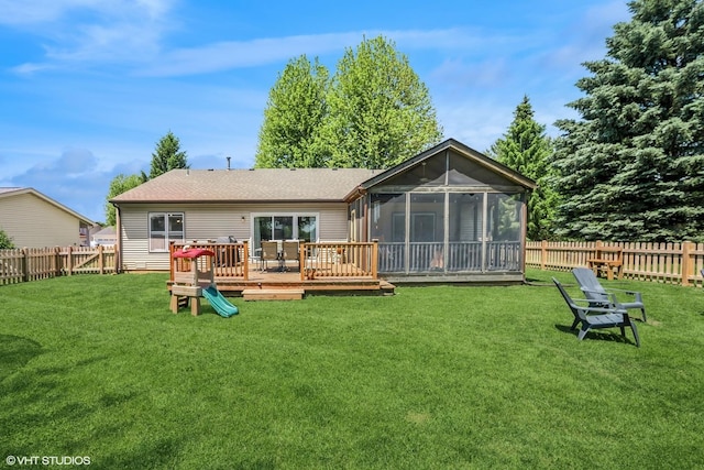 204 Barnwood Trl, Mchenry, IL 60050 - rear view of house with a fenced backyard, a wooden deck, and a sunroom