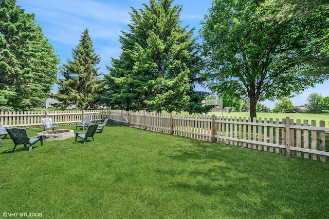 204 Barnwood Trl, Mchenry, IL 60050 - fenced yard featuring an outdoor fire pit