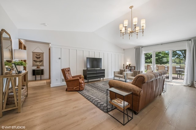 204 Barnwood Trl, Mchenry, IL 60050 - living room featuring lofted ceiling, light wood finished floors, and a chandelier