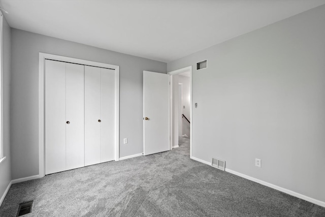 15285 State St, South Holland, IL 60473 - unfurnished bedroom with carpet flooring, baseboards, and a closet