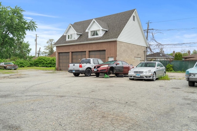 15285 State St, South Holland, IL 60473 - view of property exterior with a shingled roof and a garage