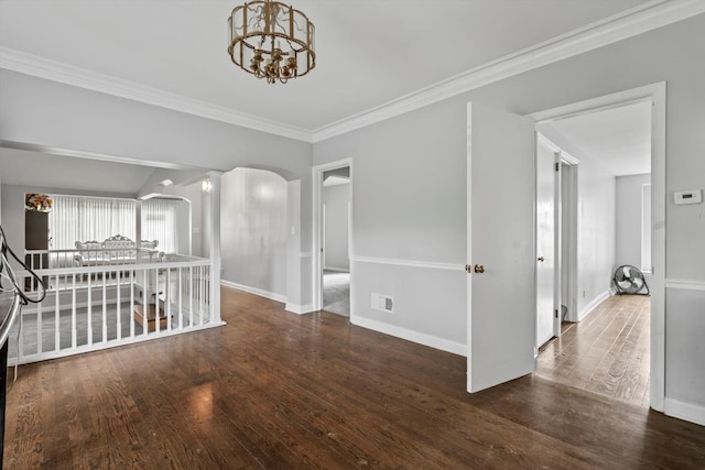 15285 State St, South Holland, IL 60473 - hall with arched walkways, ornamental molding, wood finished floors, a chandelier, and baseboards