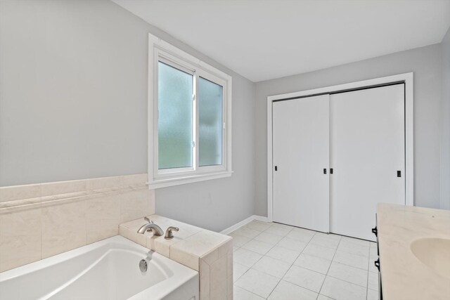15285 State St, South Holland, IL 60473 - bathroom with a bath, vanity, and tile patterned floors