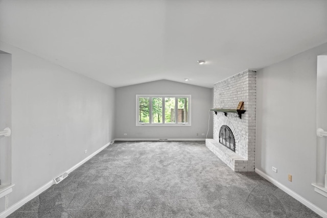 15285 State St, South Holland, IL 60473 - unfurnished living room featuring lofted ceiling, carpet floors, a fireplace, and baseboards