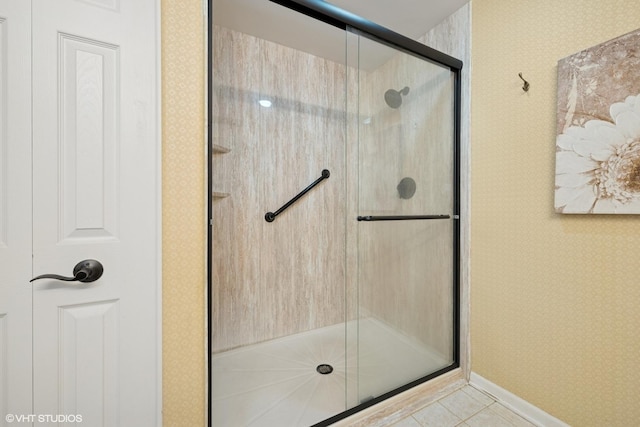 541 N Hough St Unit 205, Barrington, IL 60010 - bathroom with wallpapered walls, a stall shower, and tile patterned flooring