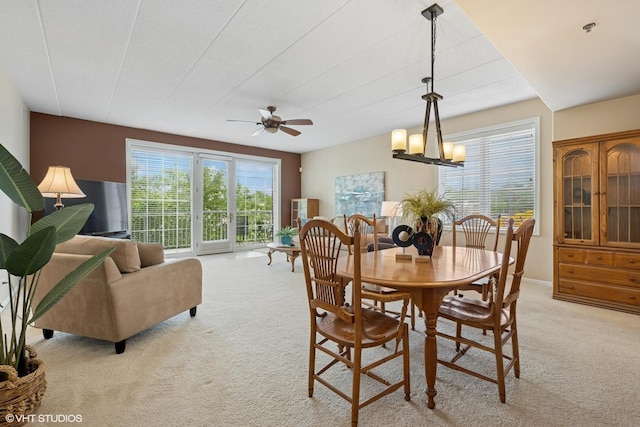 541 N Hough St Unit 205, Barrington, IL 60010 - dining room with light colored carpet, ceiling fan, and a chandelier