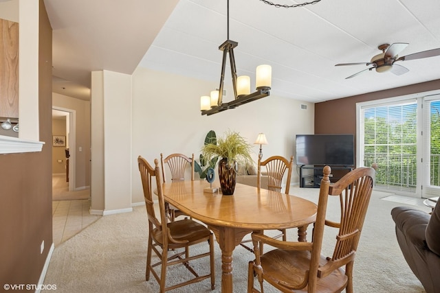 541 N Hough St Unit 205, Barrington, IL 60010 - dining room with light carpet, ceiling fan, and light tile patterned floors