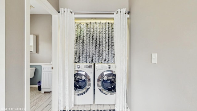 412 Joshua Tree, Harvard, IL 60033 - washroom featuring washing machine and dryer and wood finished floors