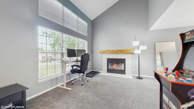 412 Joshua Tree, Harvard, IL 60033 - office with high vaulted ceiling, carpet flooring, a fireplace with flush hearth, and baseboards