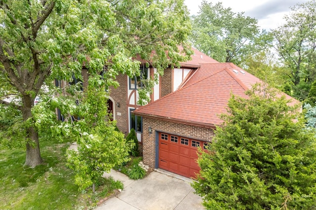 14301 Wooded Path Ln, Orland Park, IL 60462 - view of front of home with brick siding, driveway, roof with shingles, and an attached garage