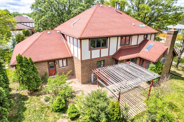 14301 Wooded Path Ln, Orland Park, IL 60462 - rear view of property featuring brick siding, stucco siding, a patio, and a shingled roof