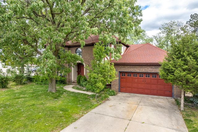 14301 Wooded Path Ln, Orland Park, IL 60462 - view of front of property featuring brick siding, a front lawn, driveway, and a garage