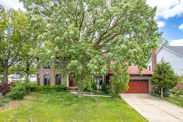 14301 Wooded Path Ln, Orland Park, IL 60462 - view of property hidden behind natural elements featuring brick siding, a garage, driveway, and a front lawn
